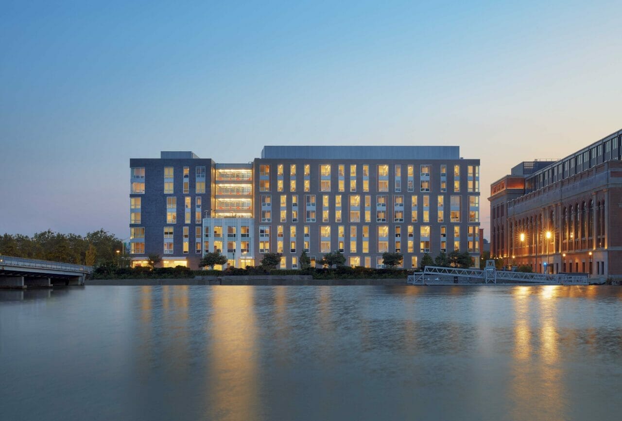 Waterfront development deploying resiliency strategies in conjunction with sustainability enhancements
